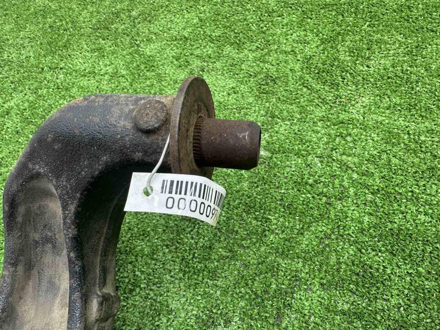 Рычаг задний левый