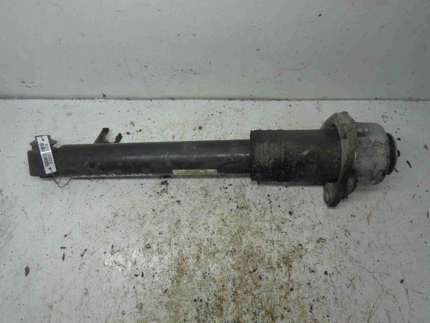 Амортизатор задний левый