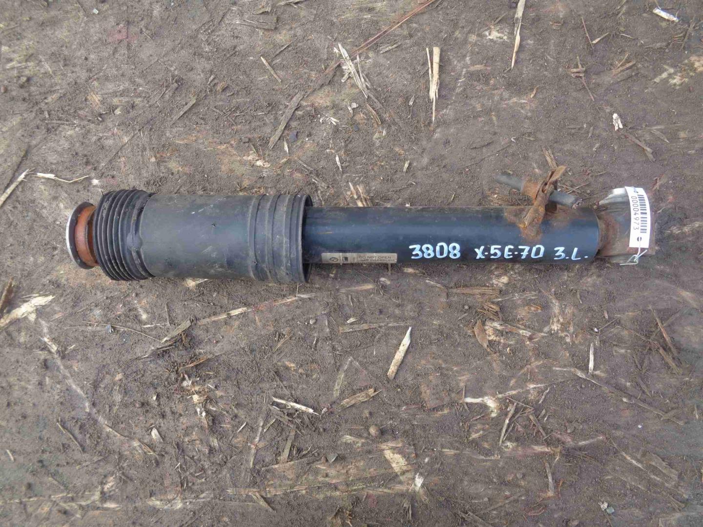 Амортизатор задний левый