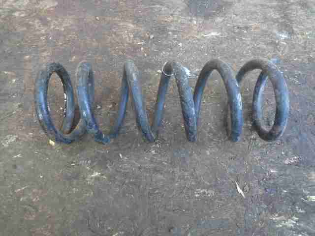 Пружина задняя