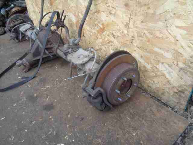 Суппорт задний левый