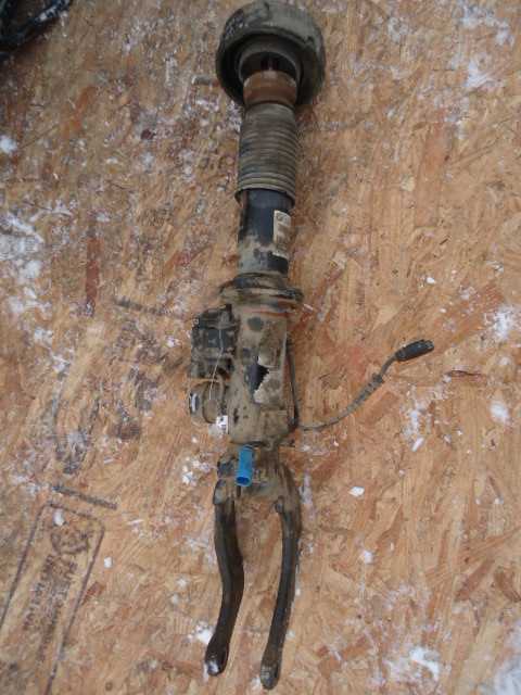 Амортизатор передний левый