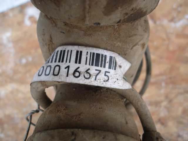 Амортизатор передний левый