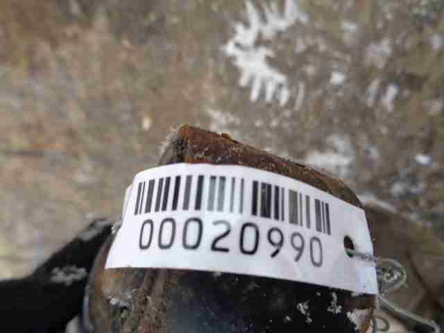 Амортизатор задний левый