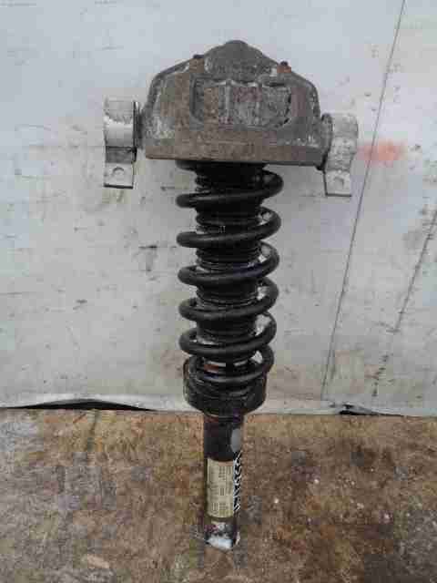 Амортизатор задний левый