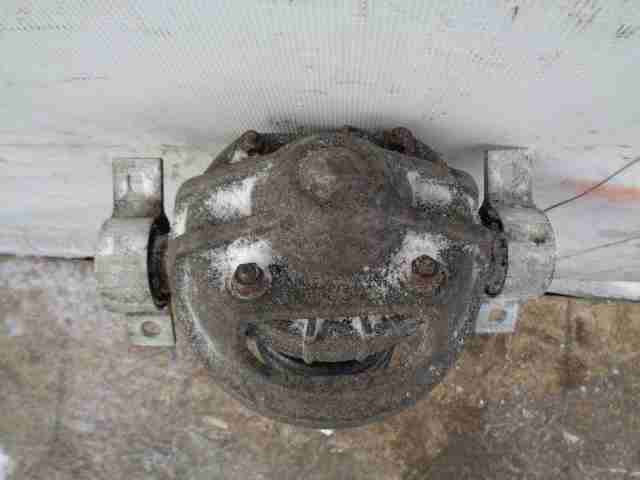 Амортизатор задний левый