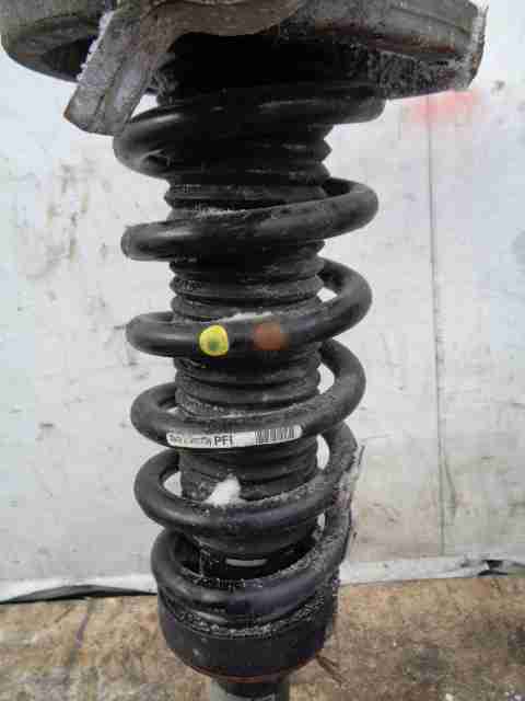 Амортизатор задний левый