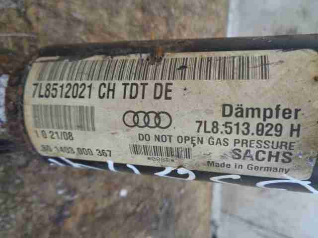 Амортизатор задний левый