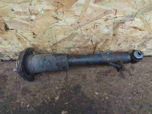 Амортизатор задний левый