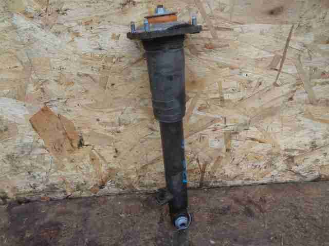 Амортизатор задний левый