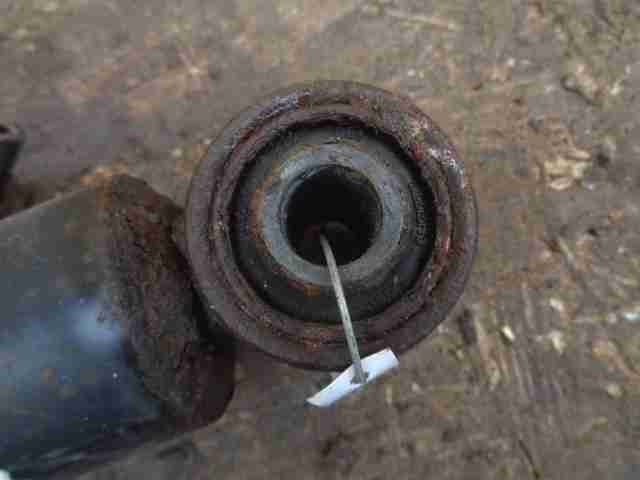 Амортизатор задний левый