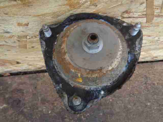 Амортизатор задний левый