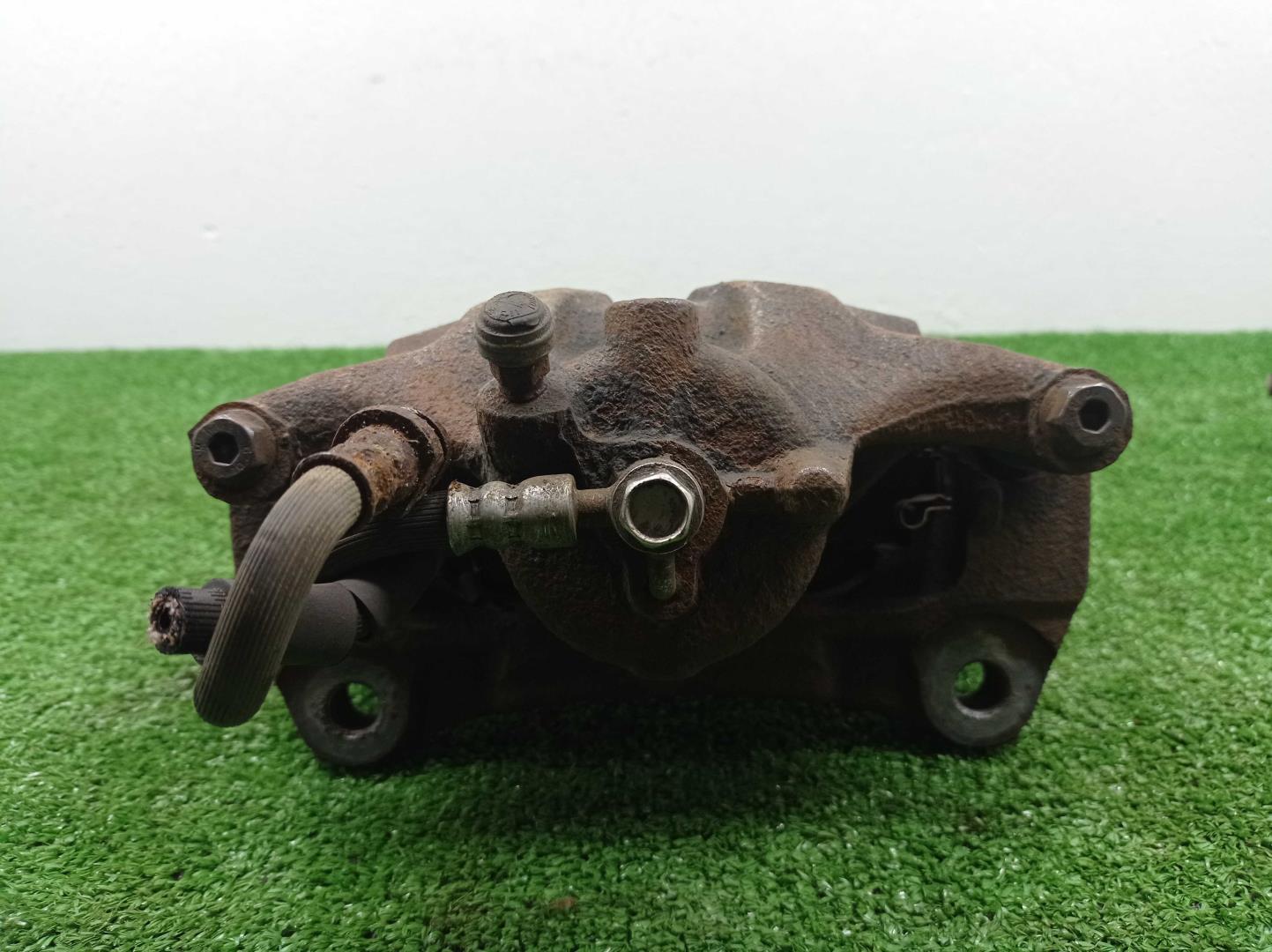 Суппорт передний левый