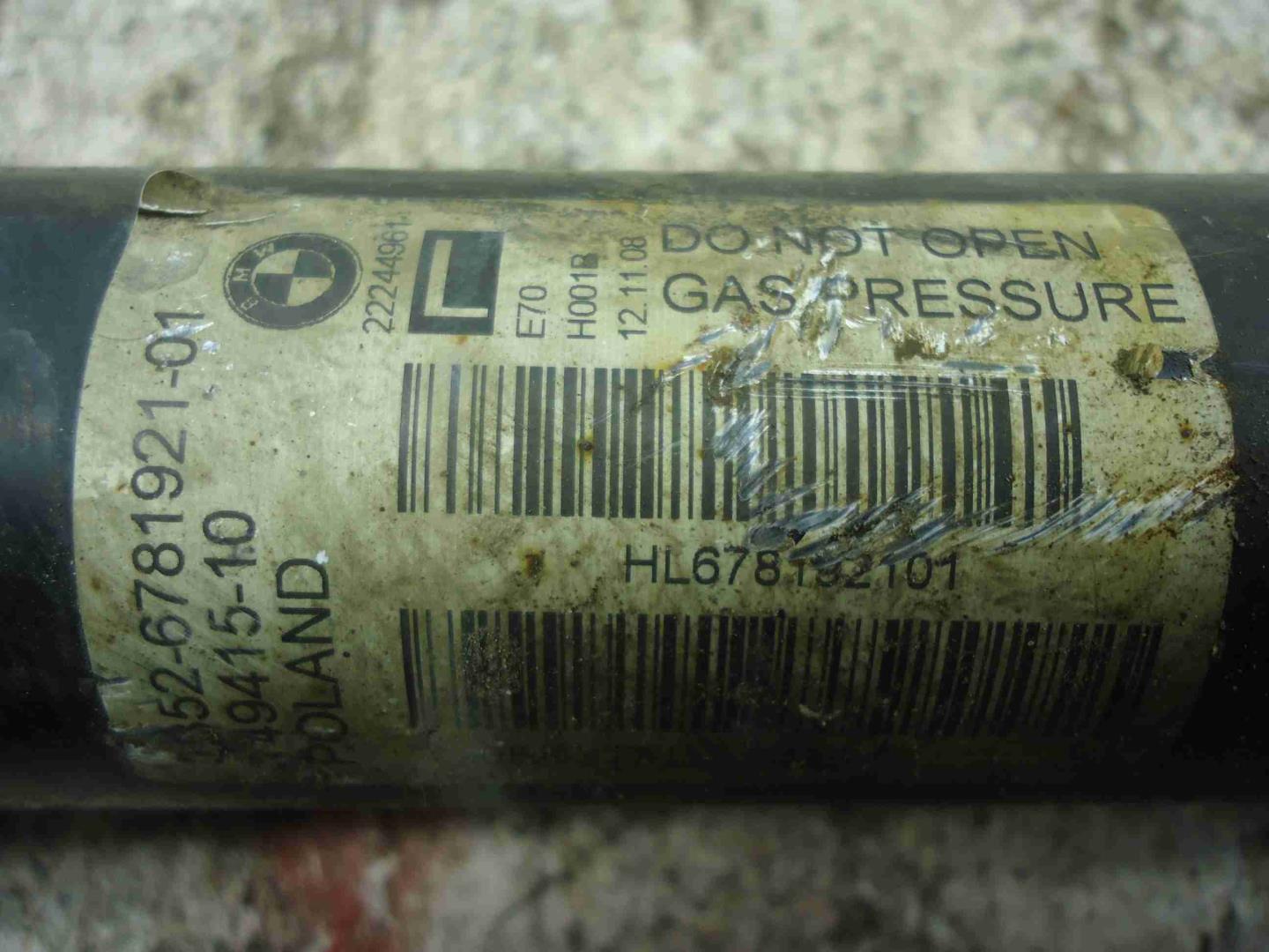 Амортизатор задний левый