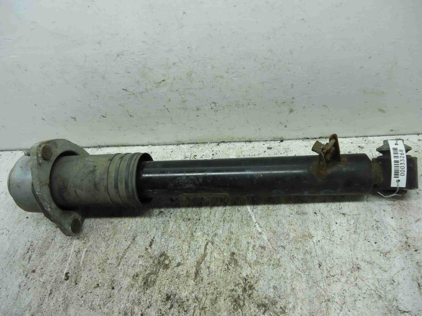 Амортизатор задний левый