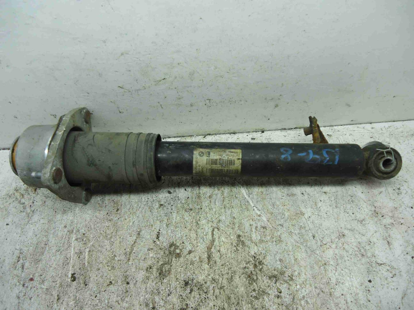 Амортизатор задний левый