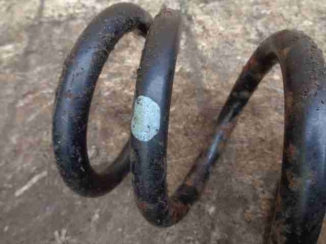 Пружина задняя