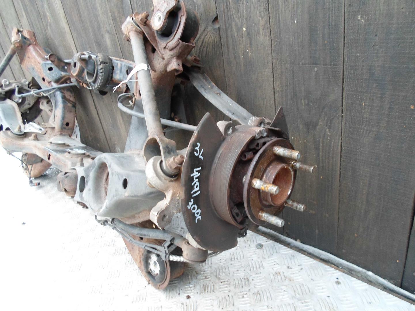 Кулак поворотный задний левый