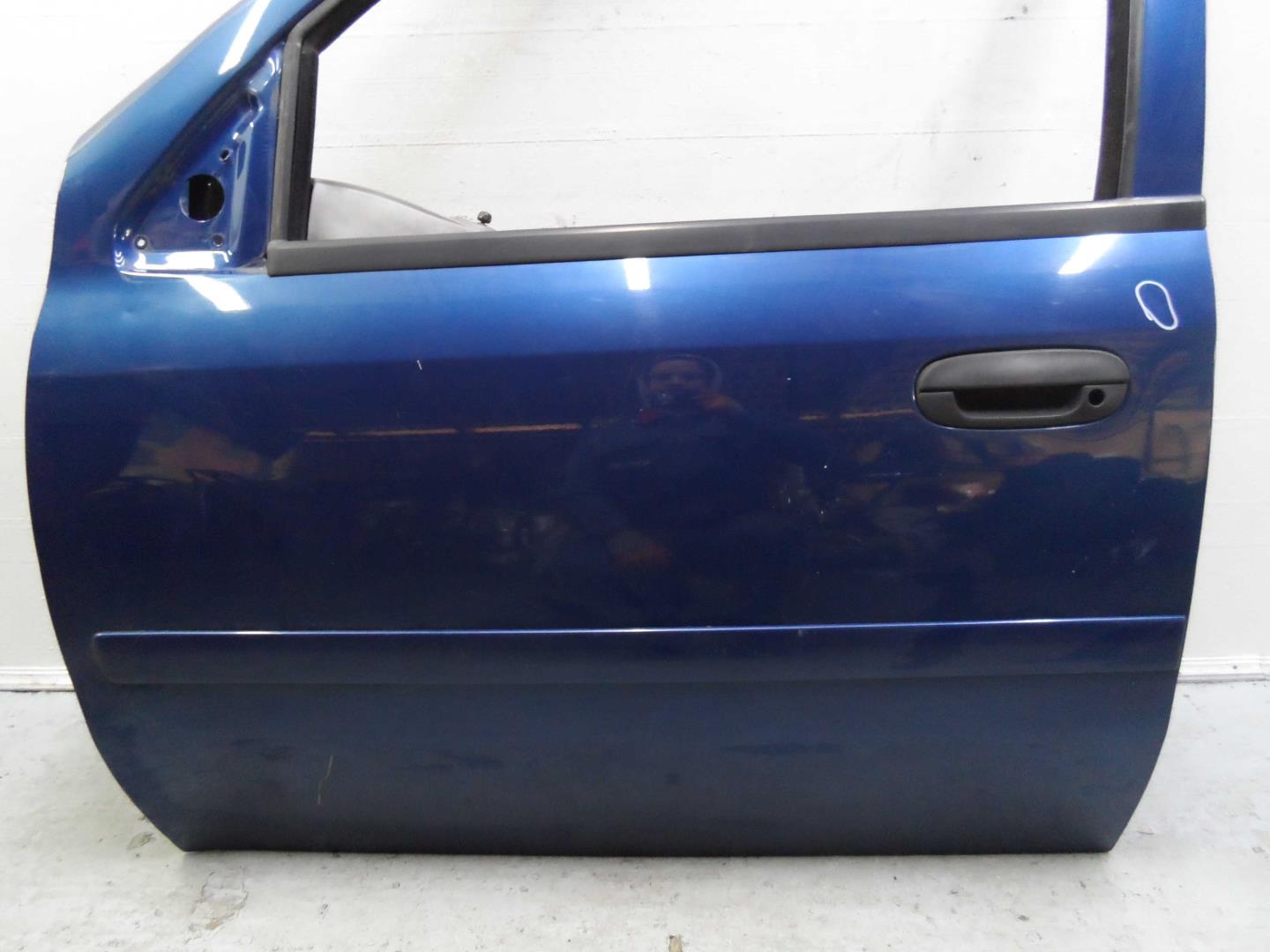 Ручка двери передней наружная левая