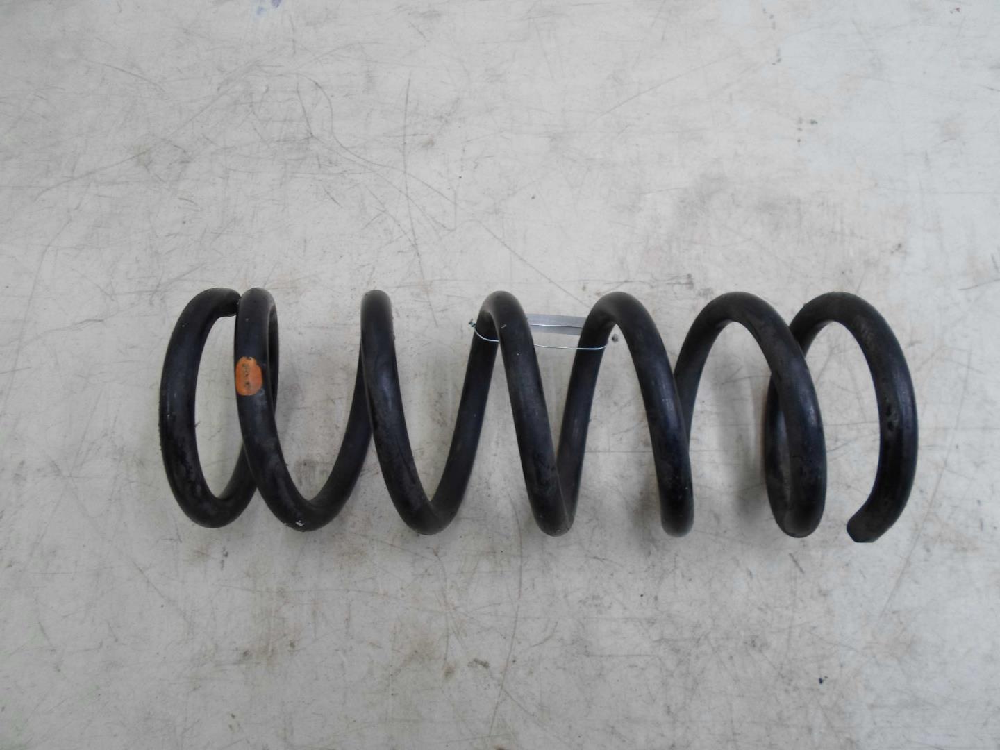 Пружина задняя