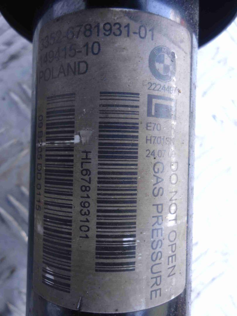 Амортизатор задний левый