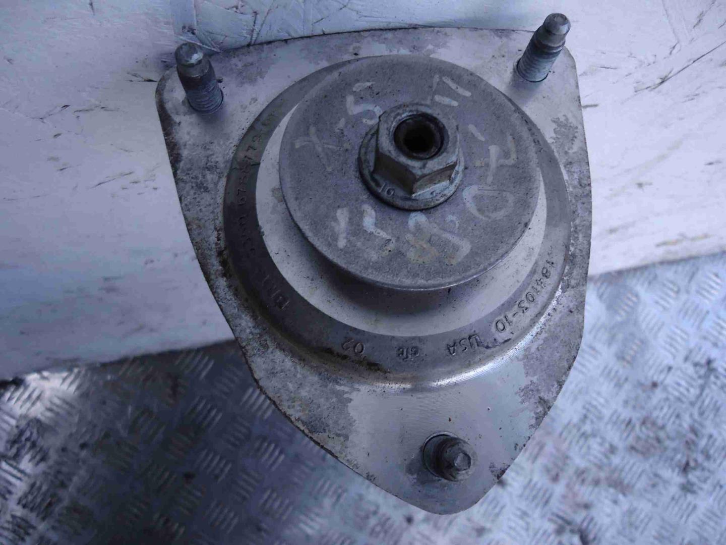 Амортизатор задний левый