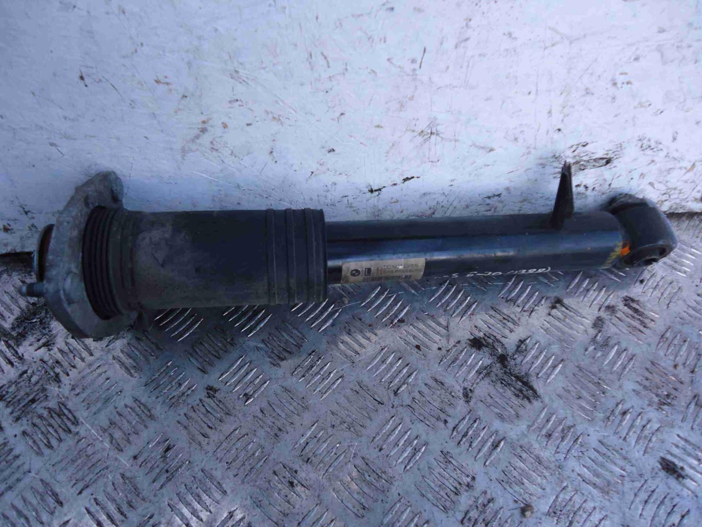 Амортизатор задний левый