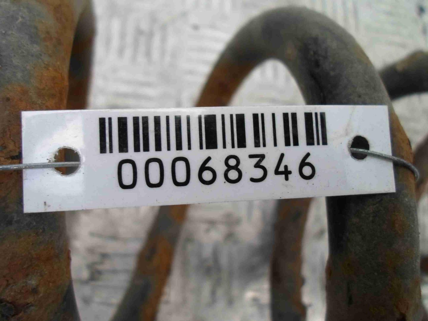 Пружина задняя