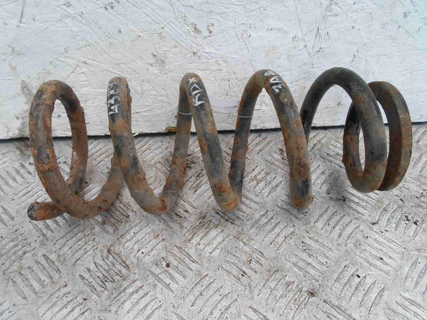 Пружина задняя