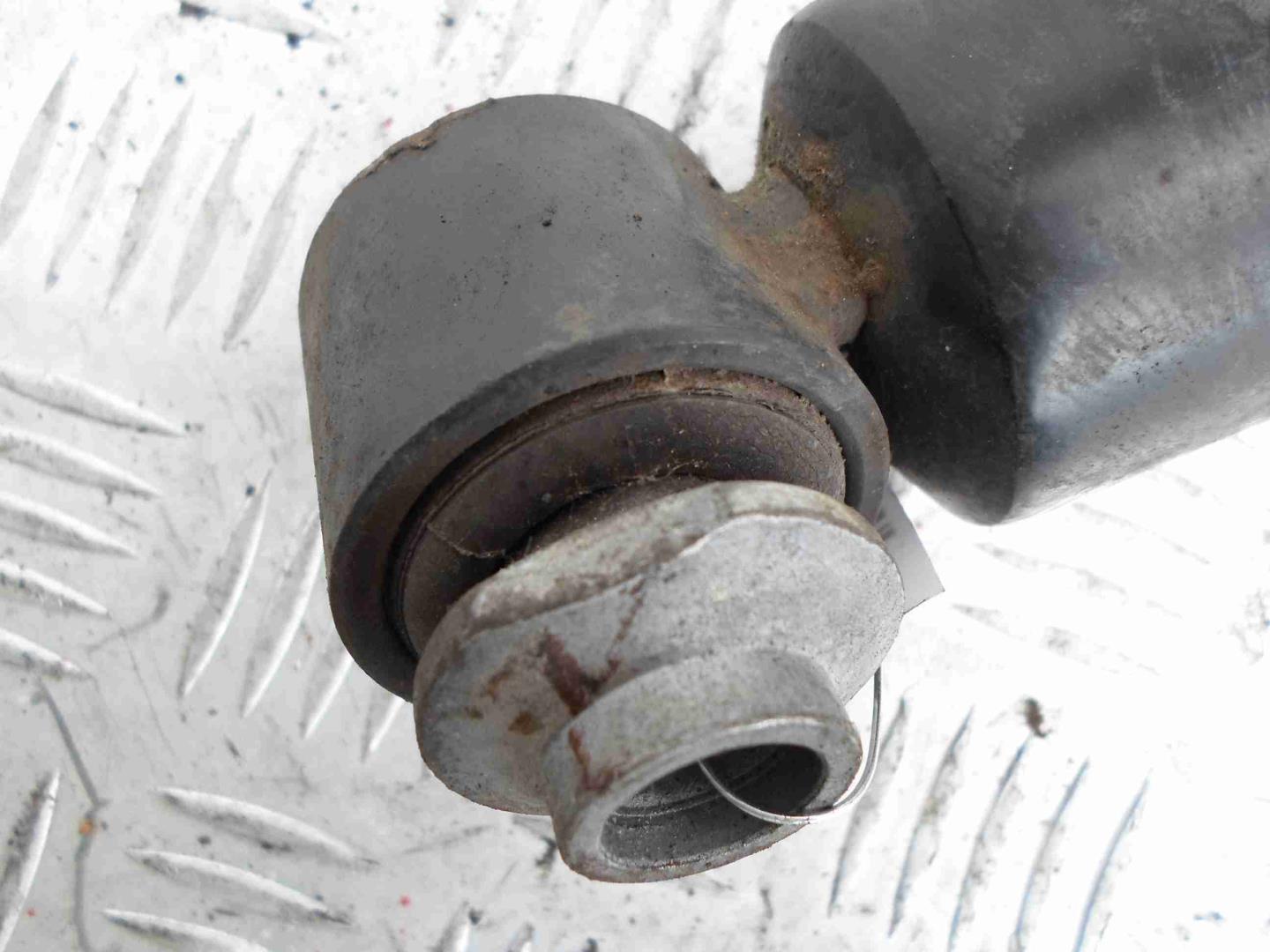 Амортизатор задний левый