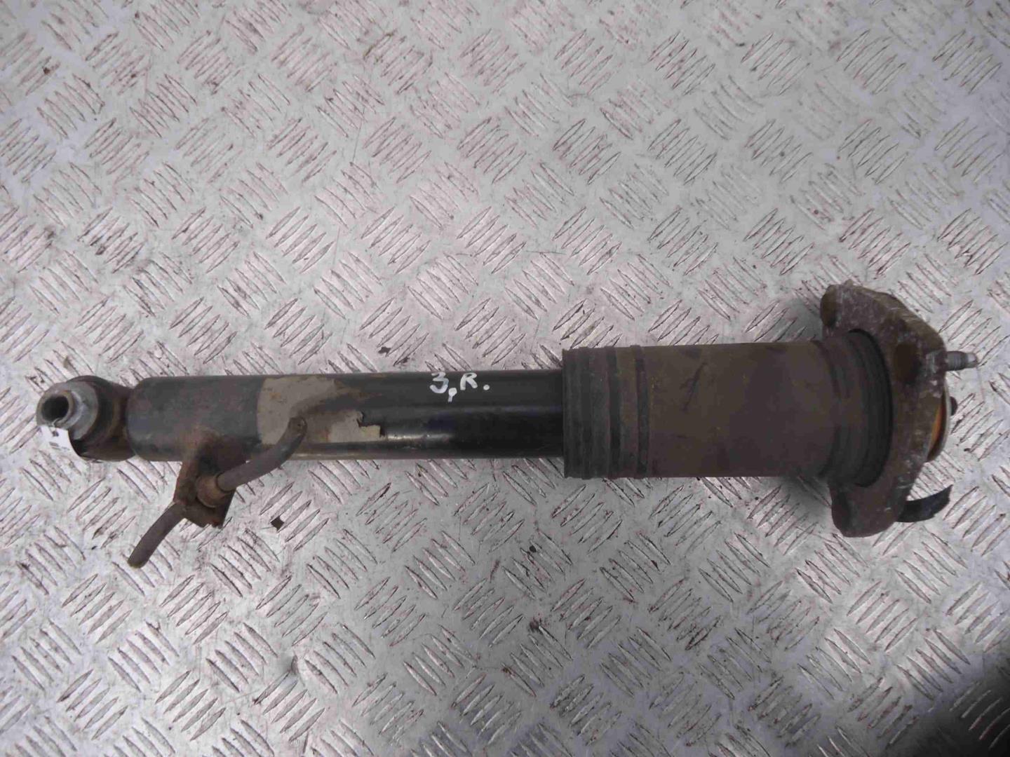 Амортизатор задний правый