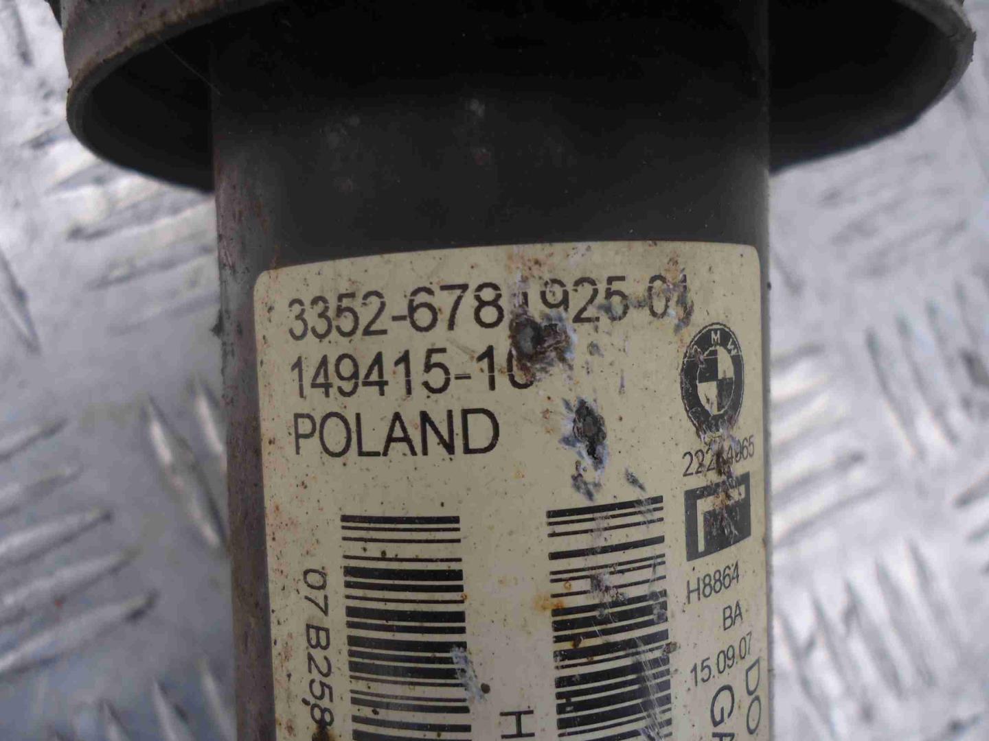 Амортизатор задний левый