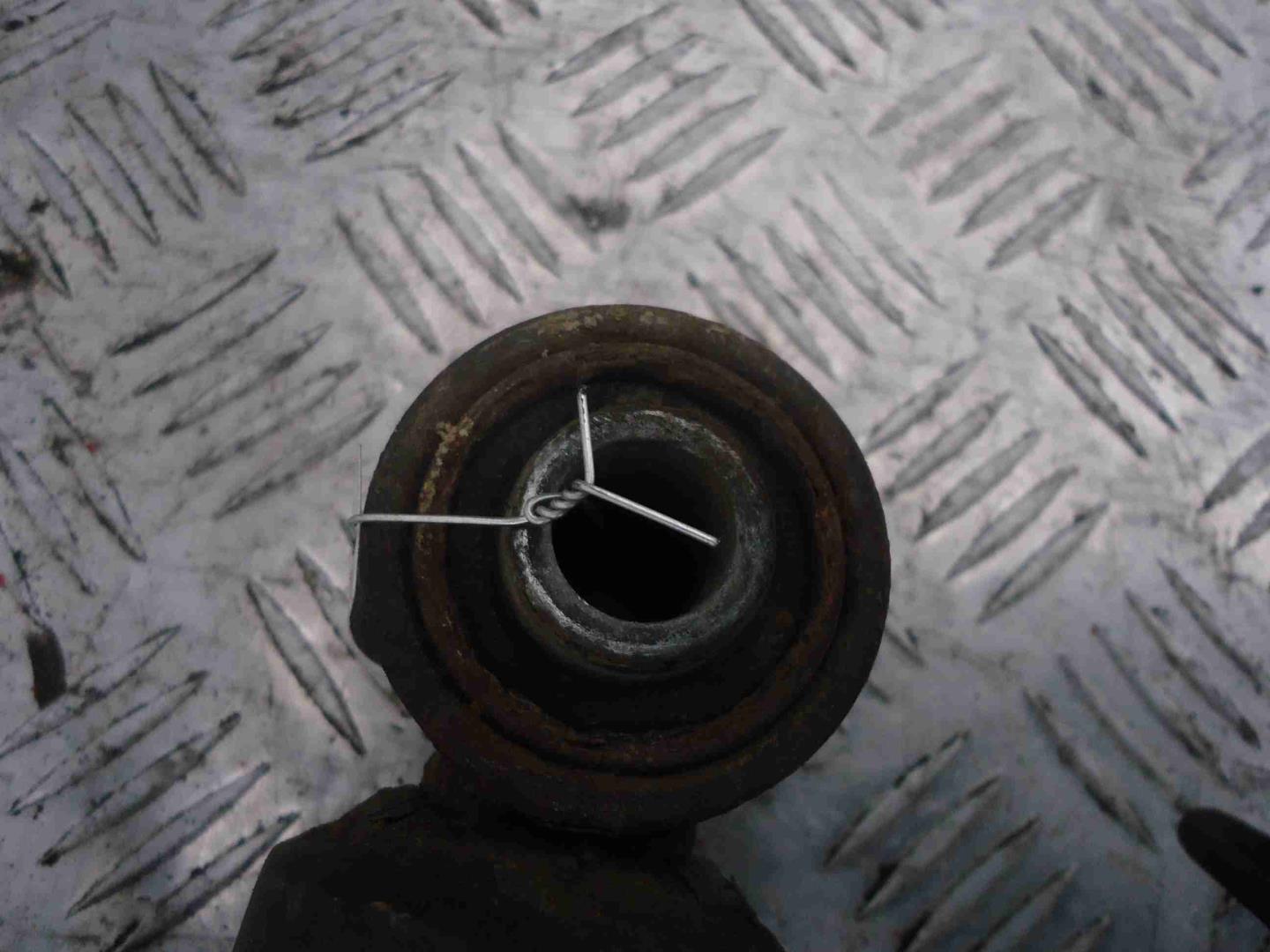 Амортизатор задний левый