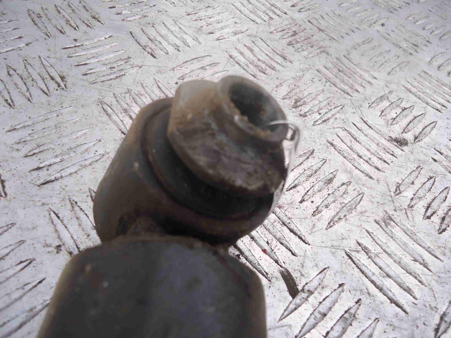 Амортизатор задний левый