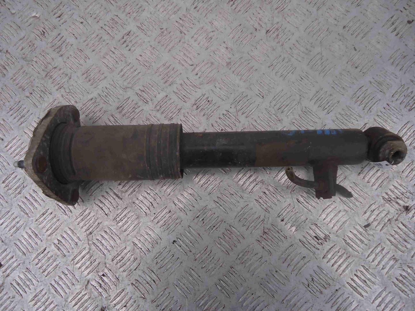 Амортизатор задний левый