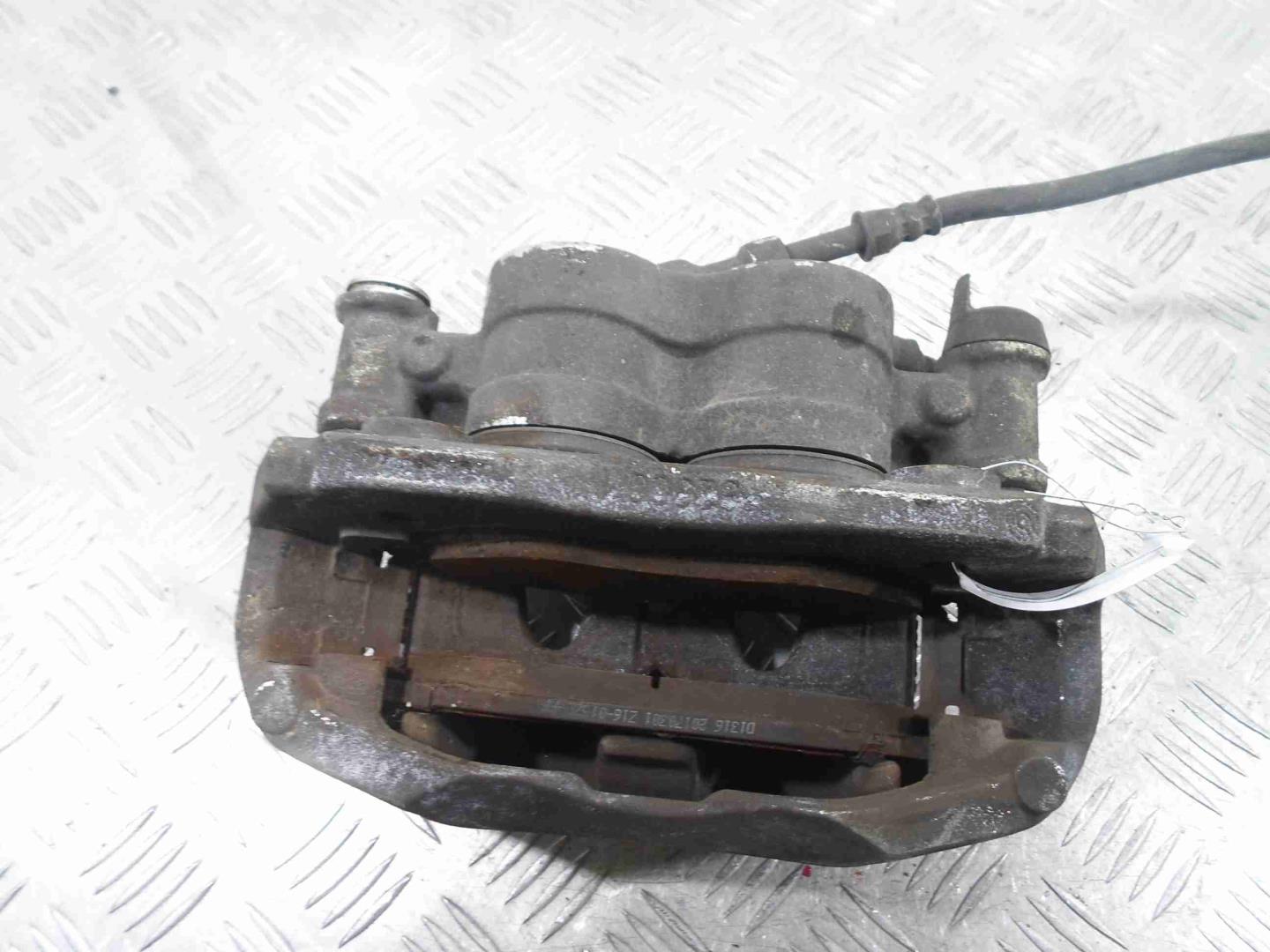 Суппорт передний левый