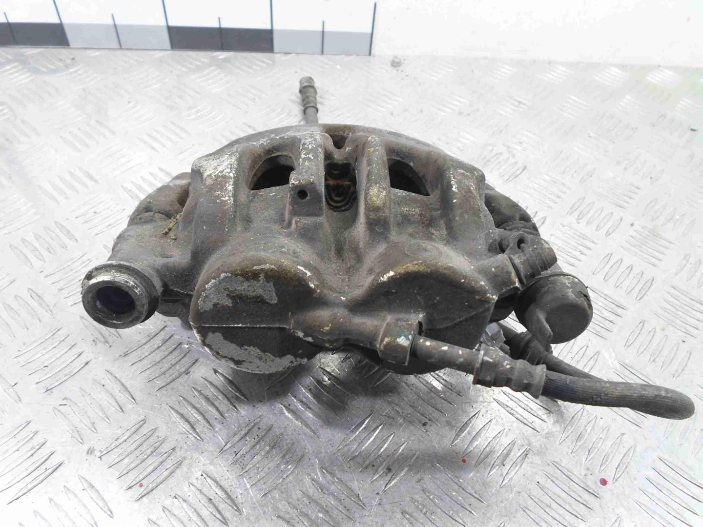 Суппорт передний левый