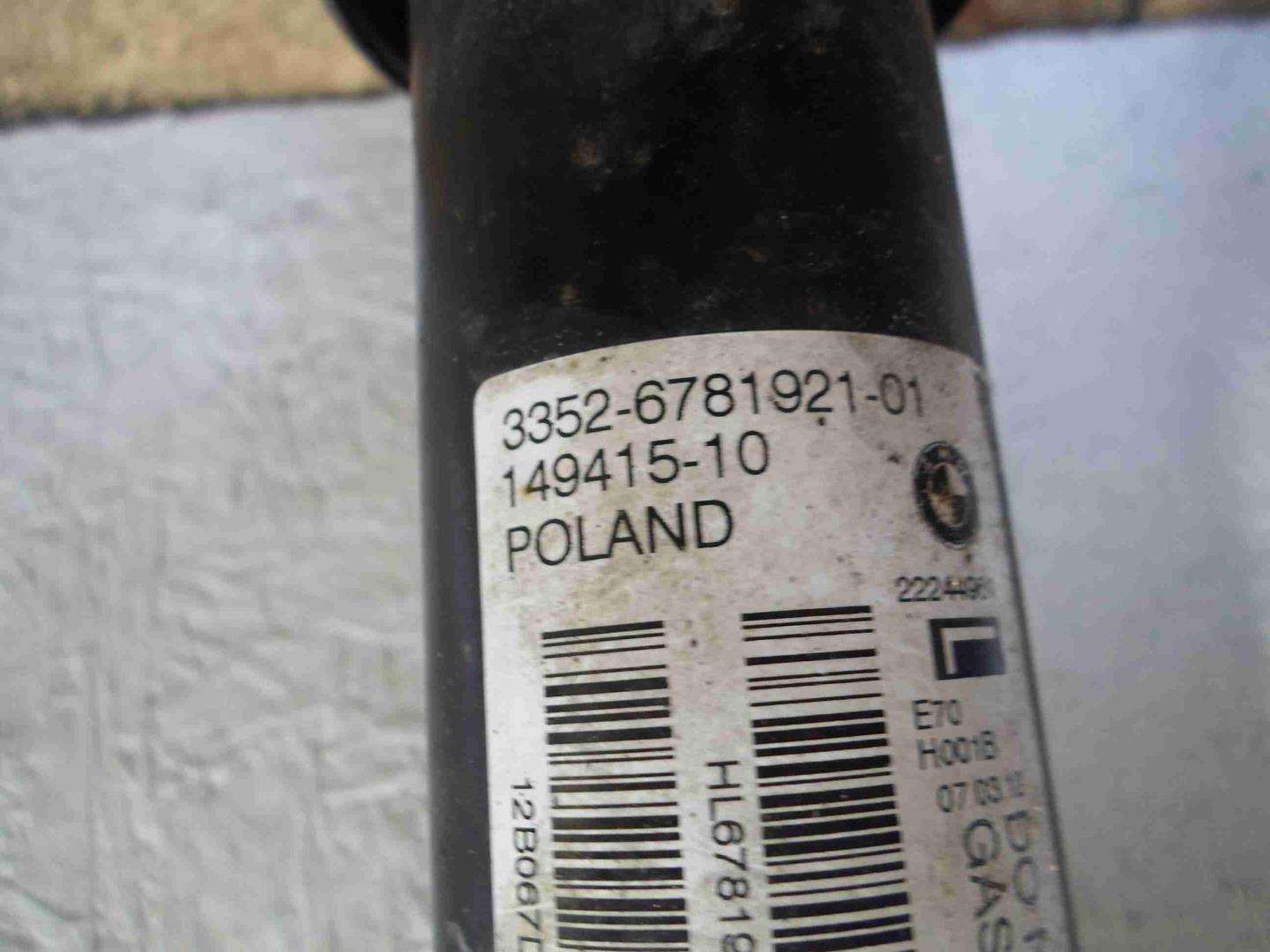 Амортизатор задний левый