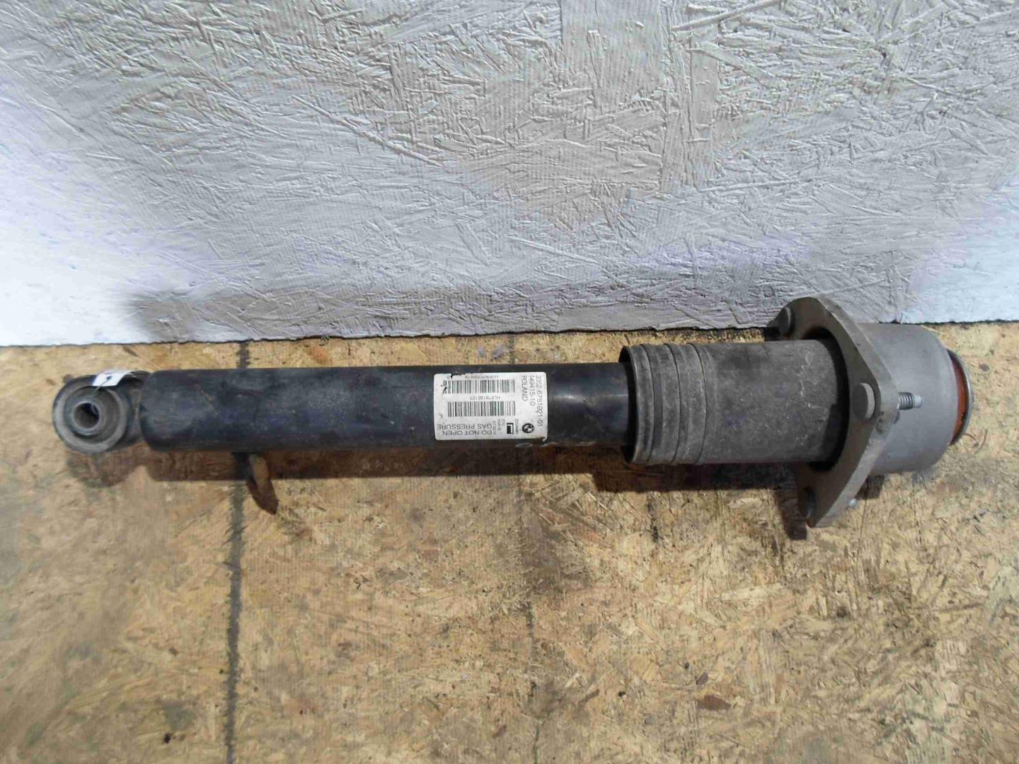 Амортизатор задний левый