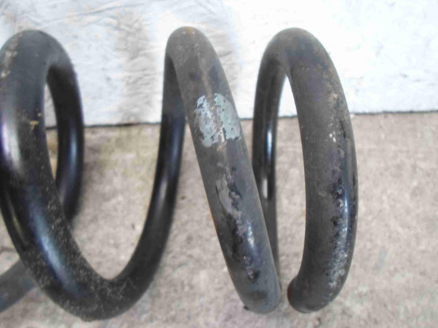 Пружина задняя