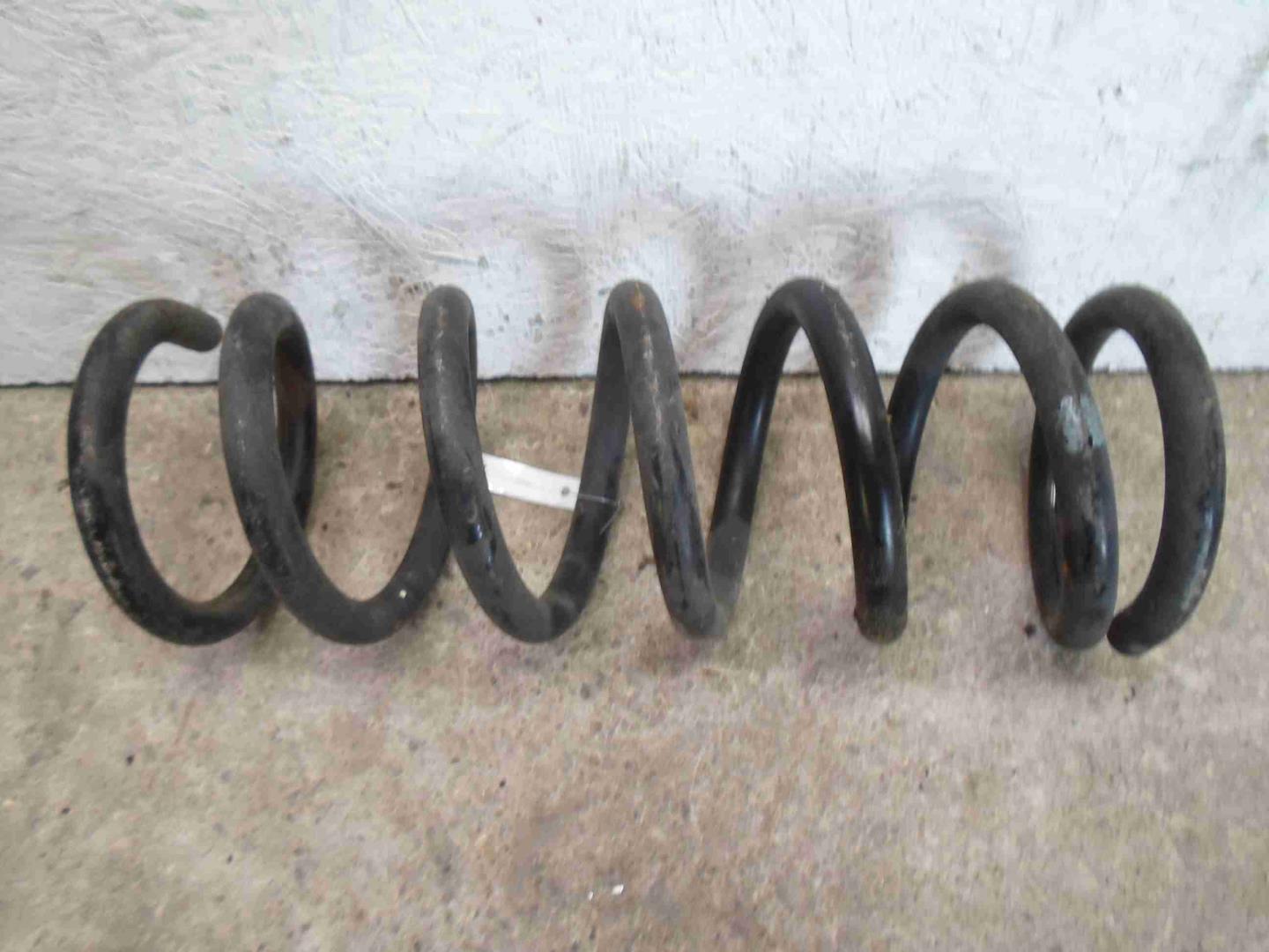 Пружина задняя