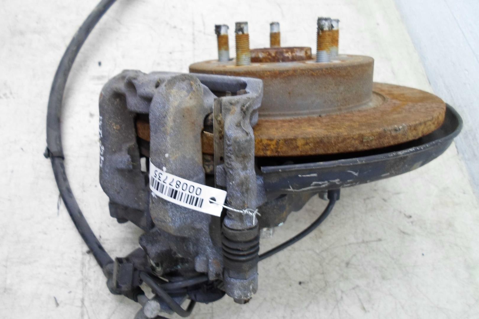 Суппорт задний левый