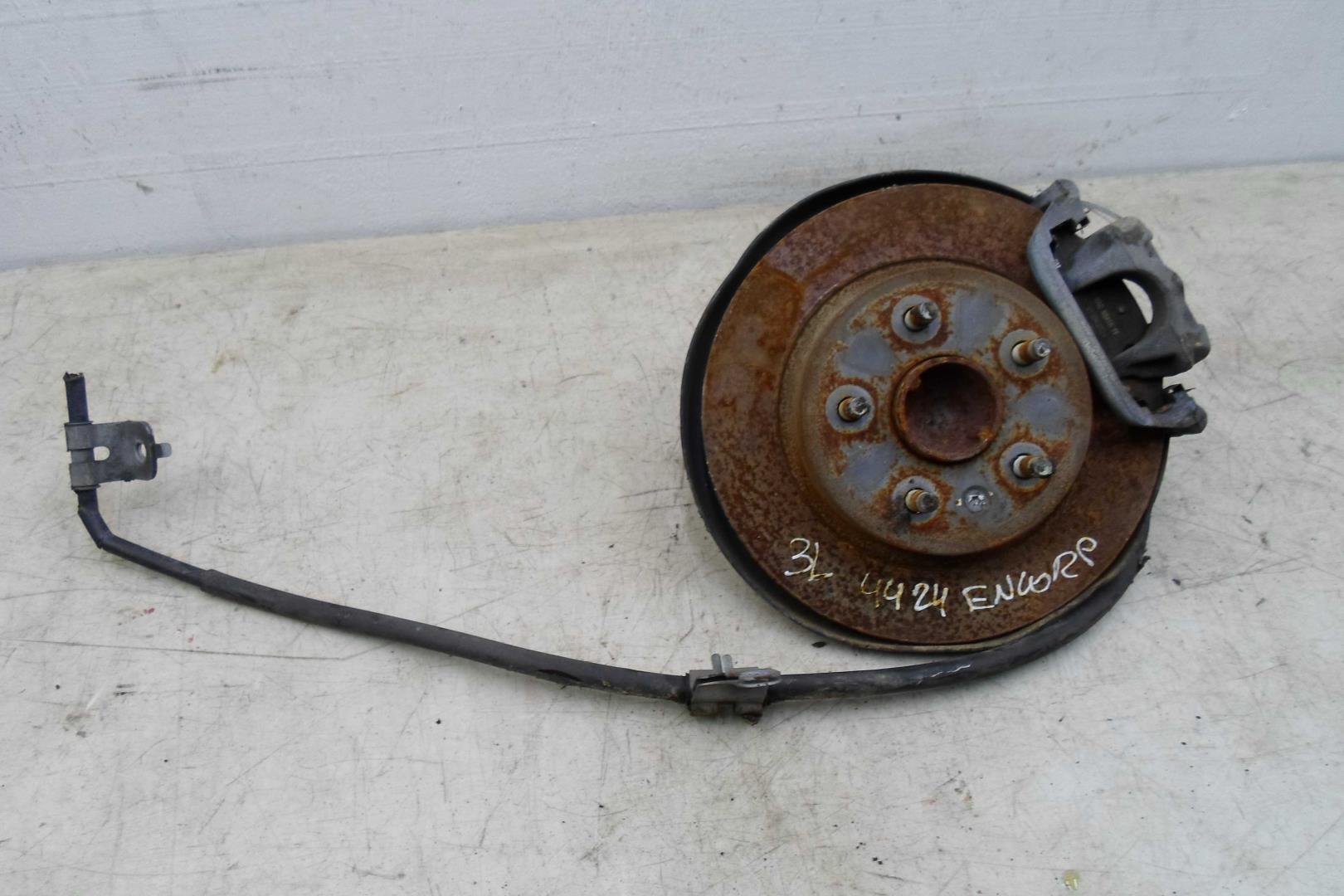 Суппорт задний левый