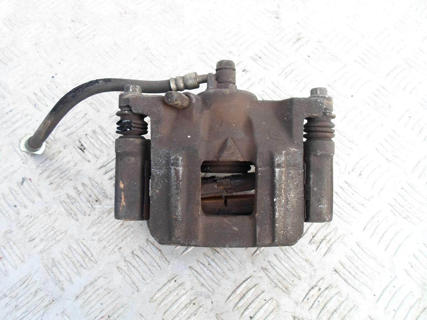 Суппорт задний левый