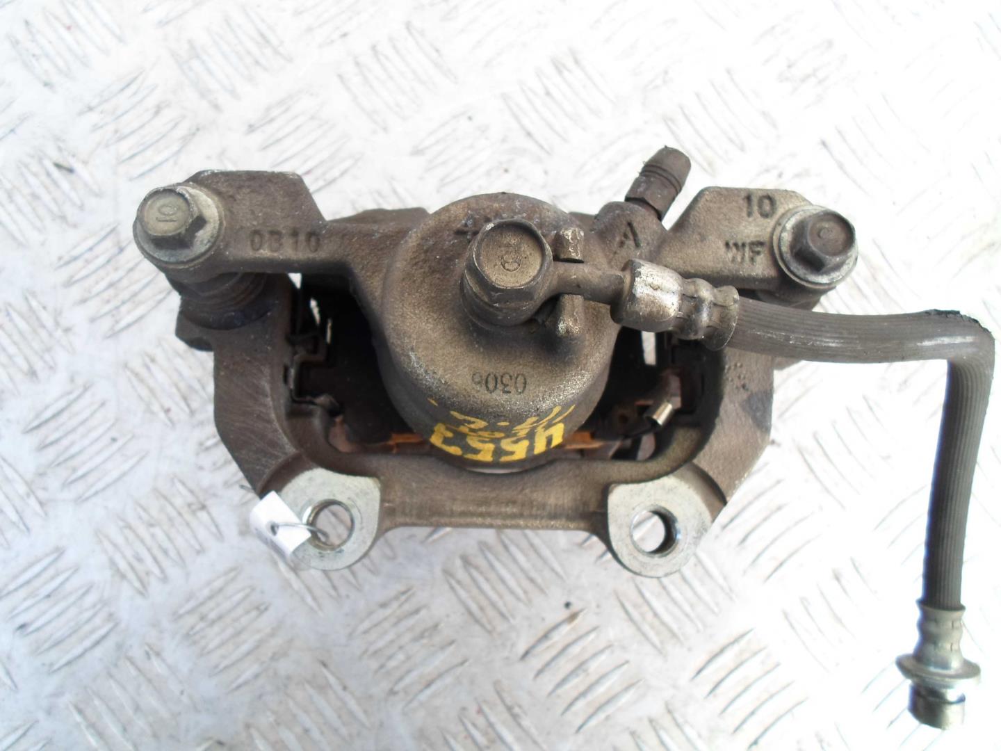 Суппорт задний левый