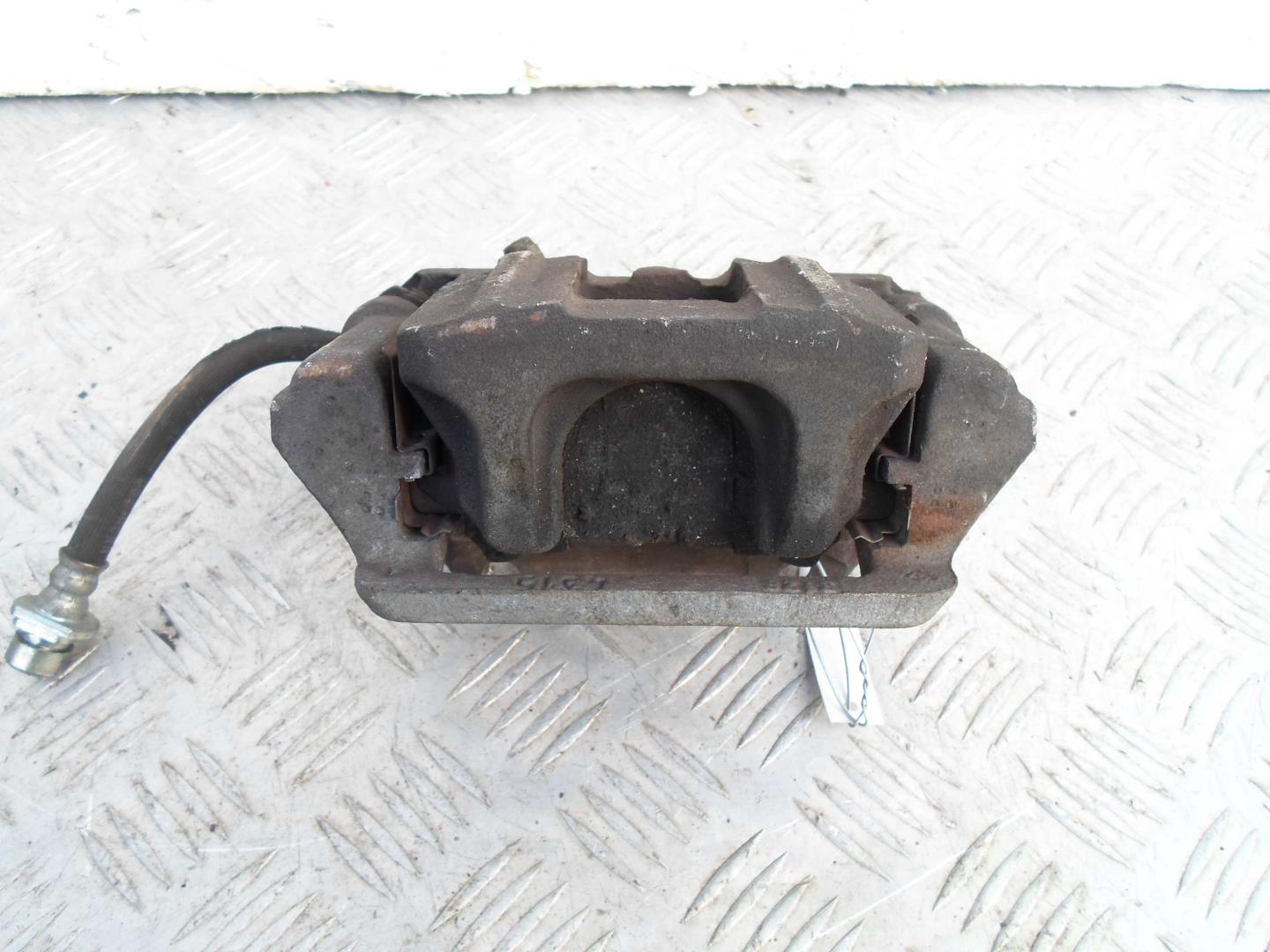 Суппорт задний левый