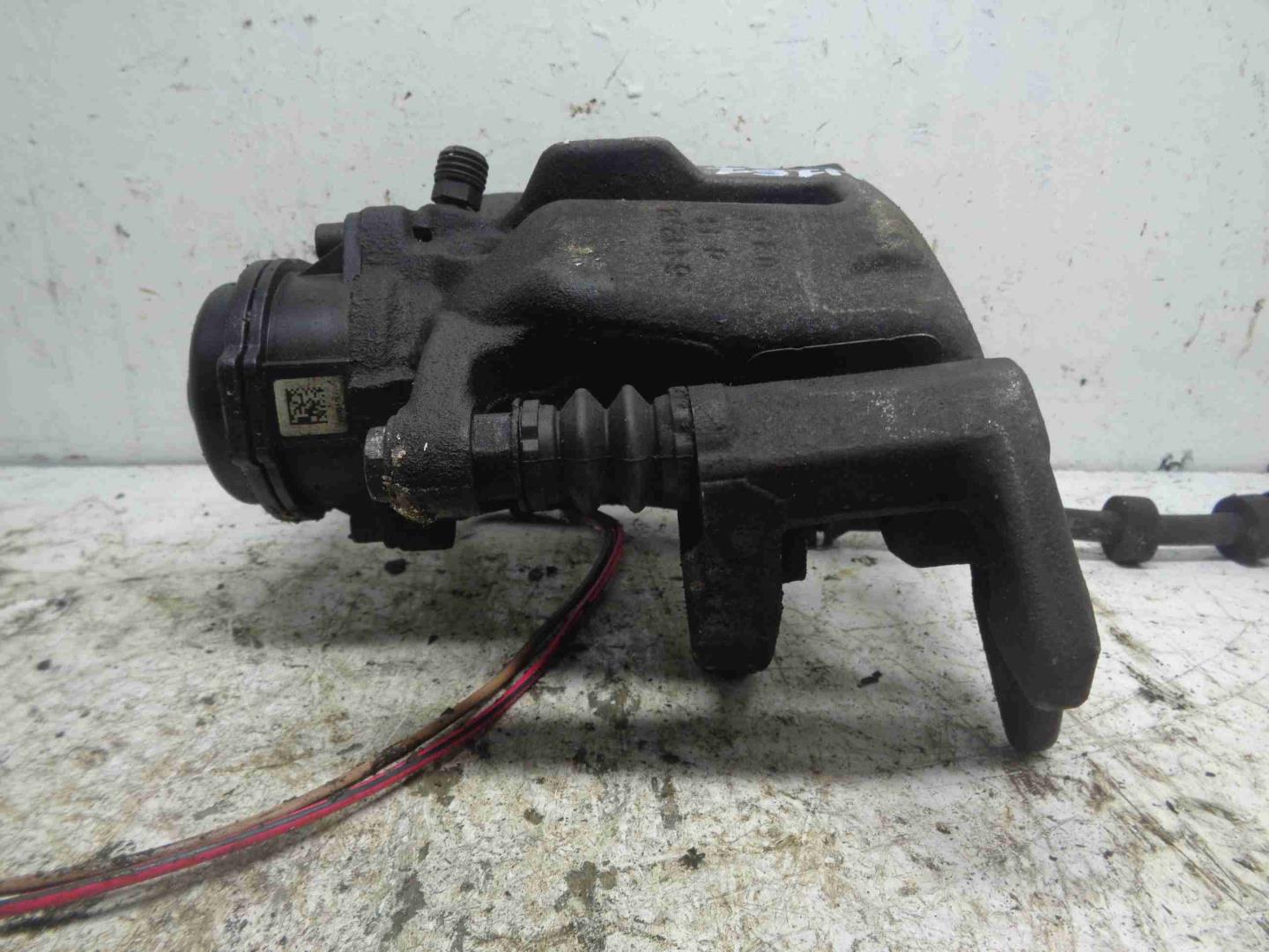 Суппорт задний левый