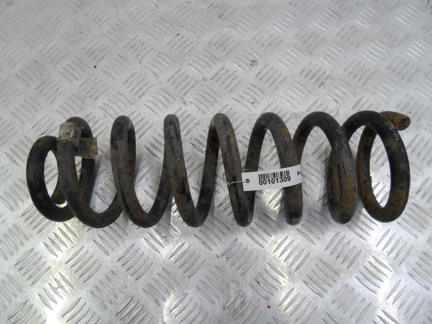 Пружина задняя