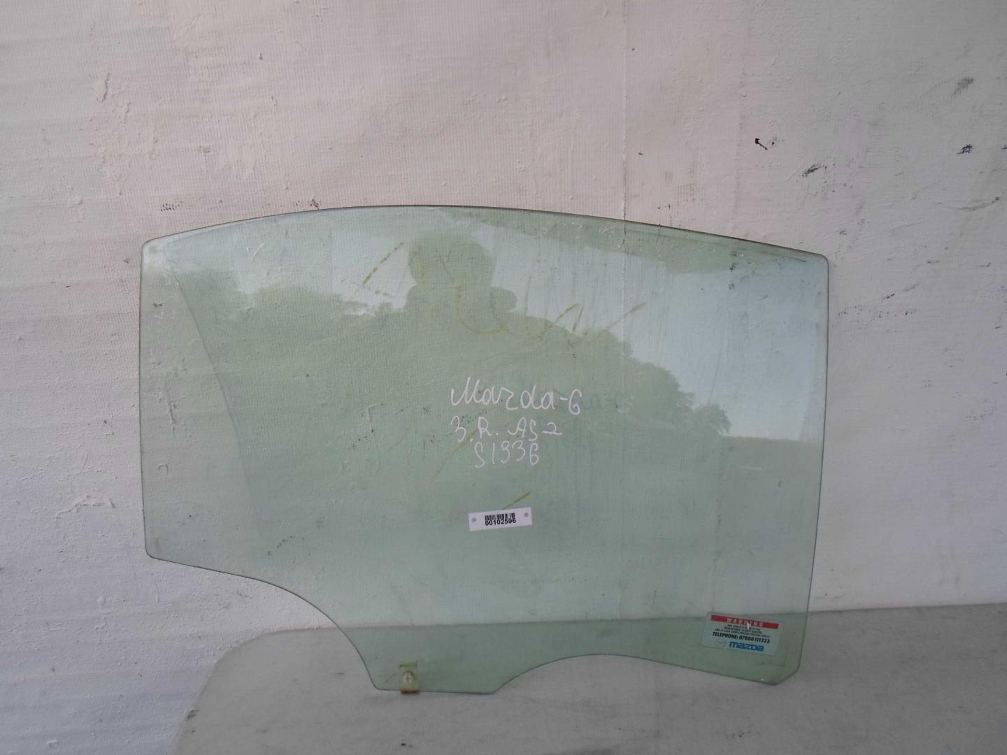 Стекло двери задней правой