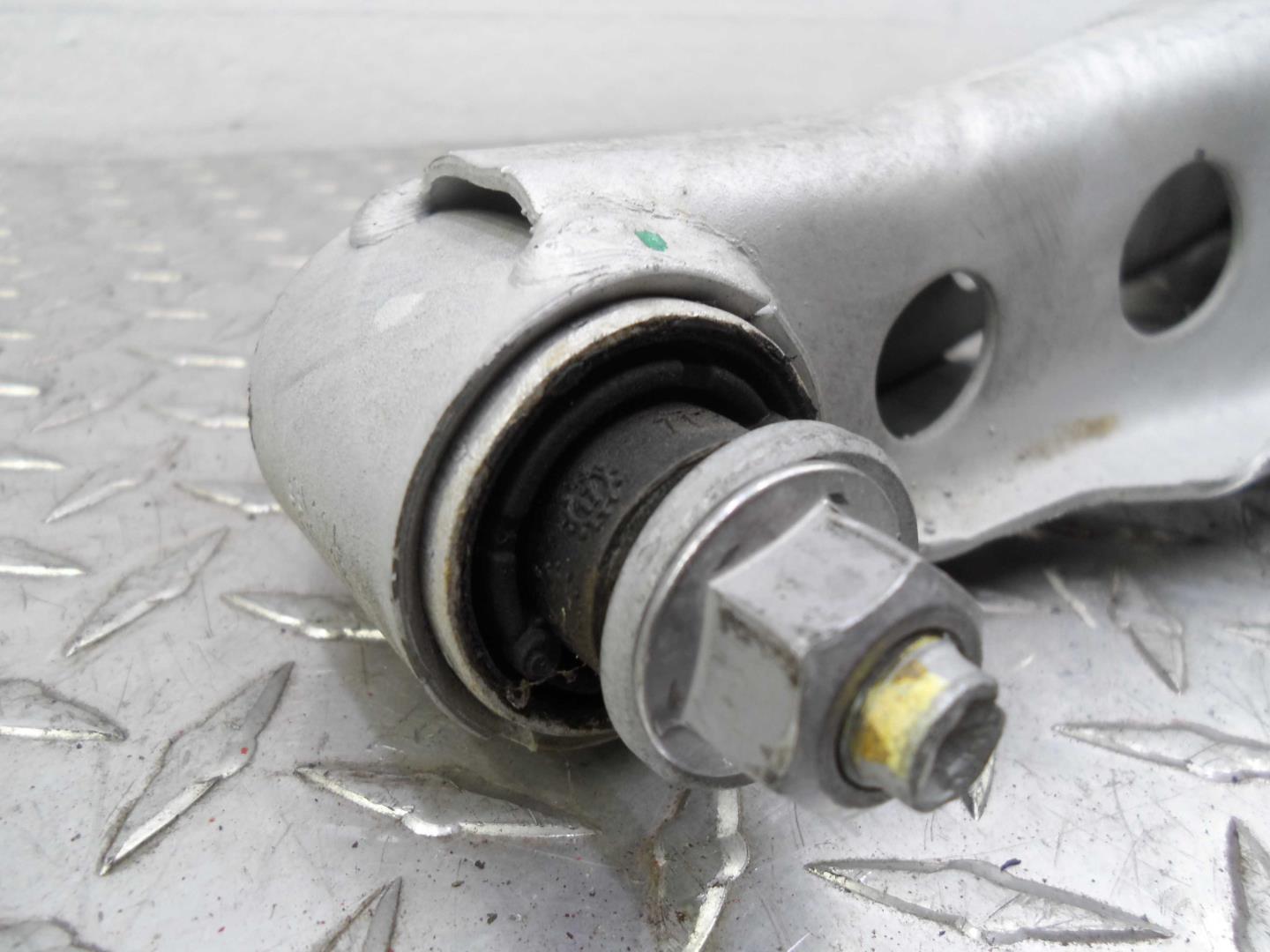 Рычаг задний нижний левый